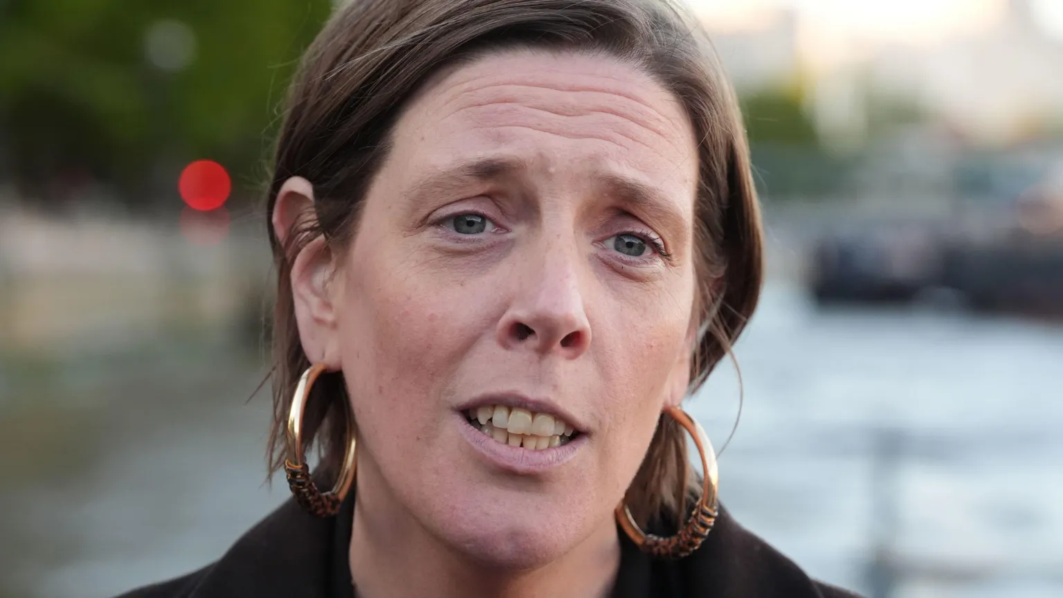 Getty Images Jess Phillips has short brown hair tucked behind her ears. She is wearing a dark jacket and is forwards.
